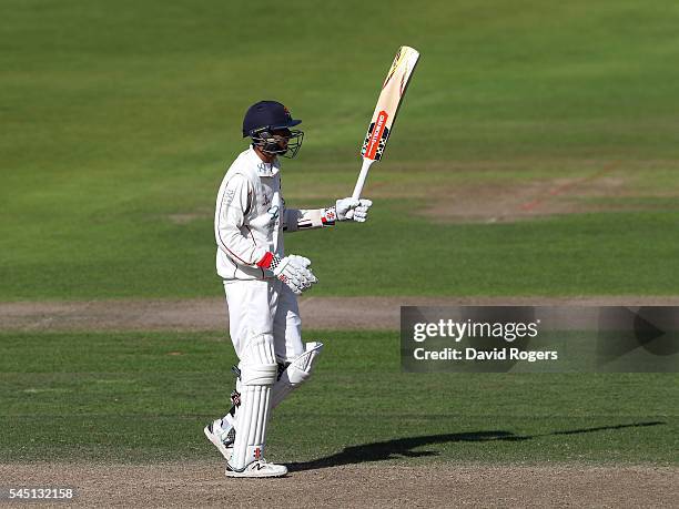 Haseeb Hameed of Lancashire celebrates after scoring a half century during the Specsavers County Championship division one match between...