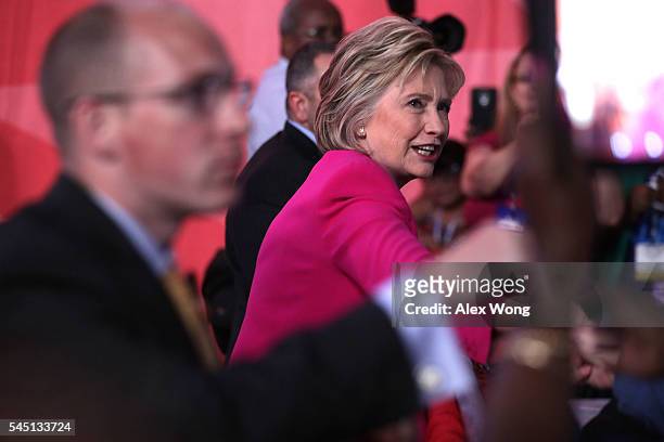 Democratic presidential candidate Hillary Rodham Clinton greets supporters after she addressed the 95th Representative Assembly of the National...