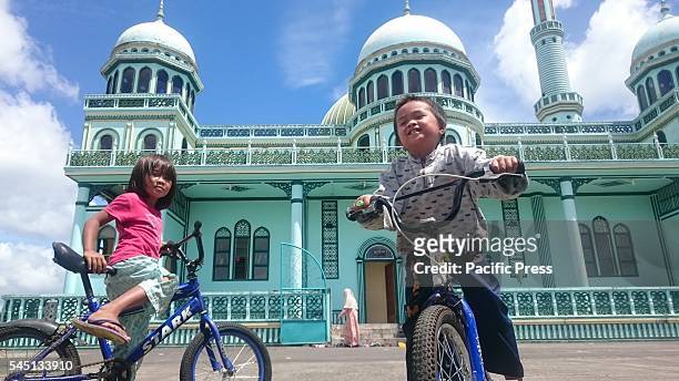 Kids playing outside Bacolod Grand Mosque in Lanao del Sur.