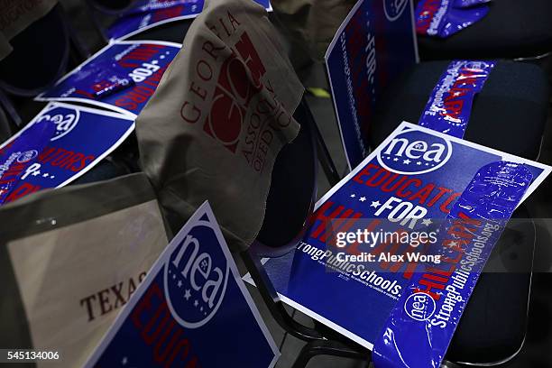 Signs are placed on chairs prior to Democratic presidential candidate Hillary Rodham Clinton's address to the 95th Representative Assembly of the...