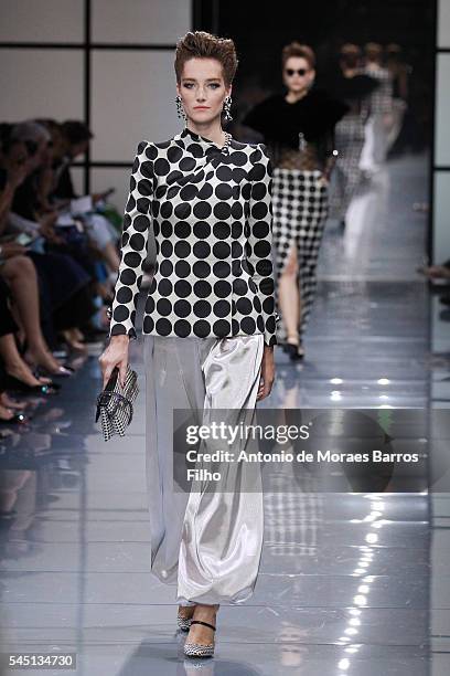 Model walks the runway during the Giorgio Armani Prive Haute Couture Fall/Winter 2016-2017 show as part of Paris Fashion Week on July 5, 2016 in...