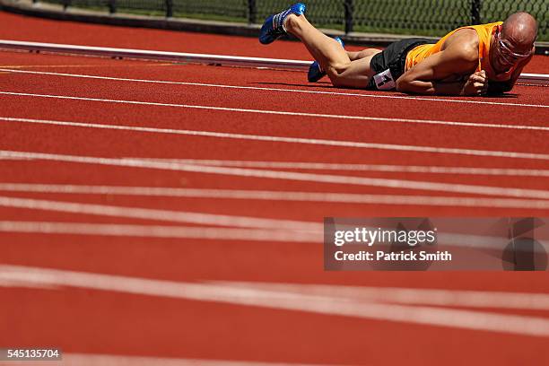 Jeremy Wariner falls to the track during the Men's 400 Meter Dash Semi-finals during the 2016 U.S. Olympic Track & Field Team Trials at Hayward Field...