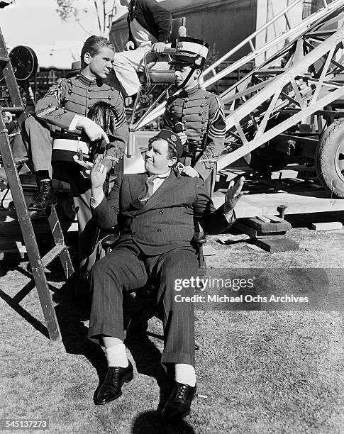 Actors Jackie Cooper, Andy Devine, Freddie Bartholomew pose on the set of "Spirit of Culver" in Los Angeles, California.