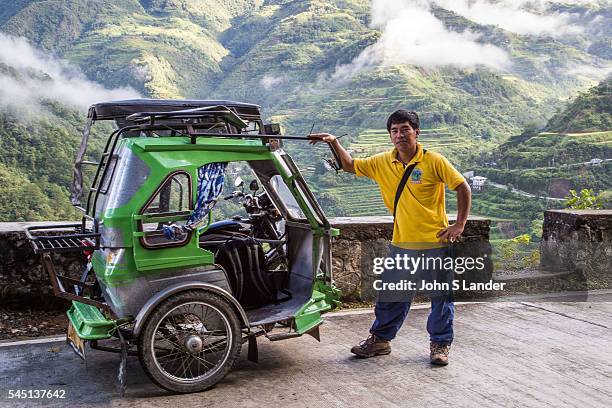 Philippines Tricycle, the local version of a tuk-tuk, is really just a motorbike hitched onto a sidecar for passengers. The motorbike can also be...