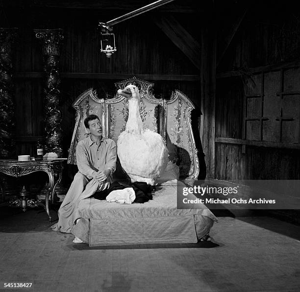 Singer Max Bygraves and his singing comic goose performs on the "Toast of the Town" show hosted by Ed Sullivan at the Maxine Elliott Theater in New...