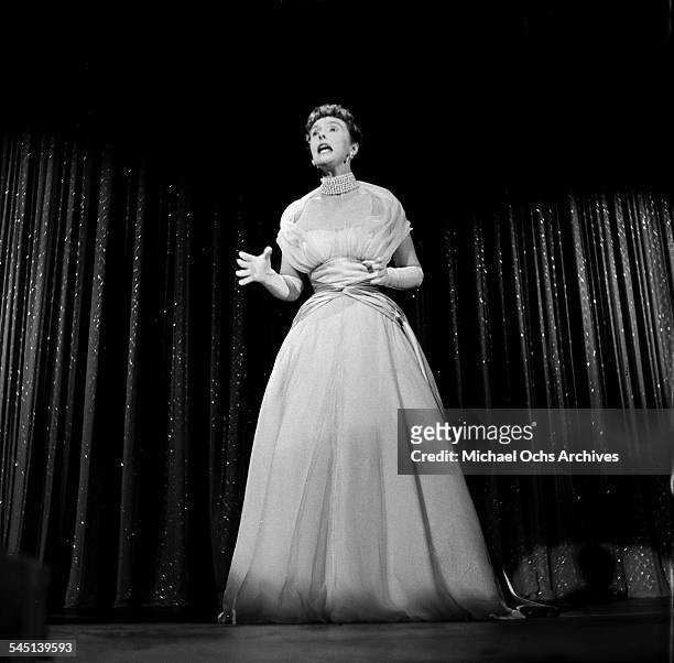 British comedian Joyce Grenfell performs on the "Toast of the Town" show hosted by Ed Sullivan at the Maxine Elliott Theater in New York, New York.