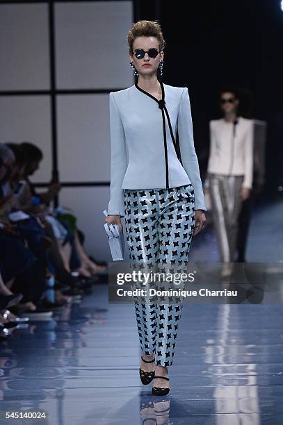 Model walks the runway during the Giorgio Armani Prive Haute Couture Fall/Winter 2016-2017 show as part of Paris Fashion Week on July 5, 2016 in...