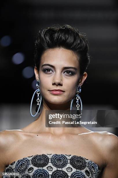 Model walks the runway during the Giorgio Armani Prive Haute Couture Fall/Winter 2016-2017 show as part of Paris Fashion Week on July 5, 2016 in...