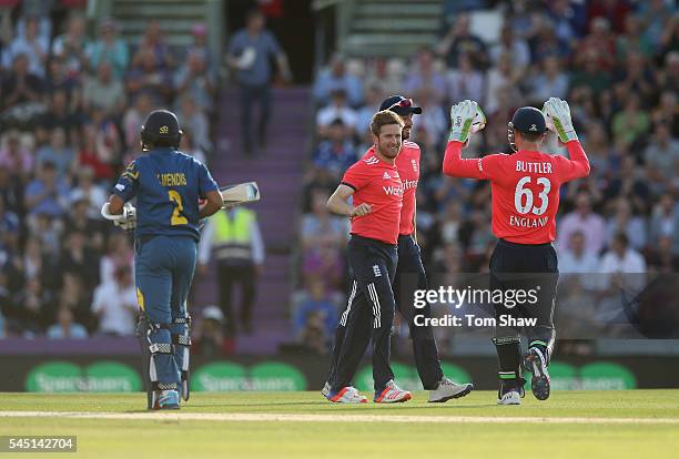 Liam Dawson of England celebrates taking the wicket of Kusal Mendis of Sri Lanka during the 1st NatWest T20 International between England and Sri...