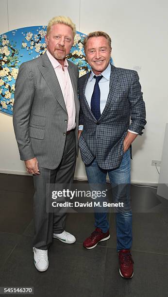 Boris Becker and Michael Flately attend the Mike Dargas exhibition at Opera Gallery on July 5, 2016 in London, England.