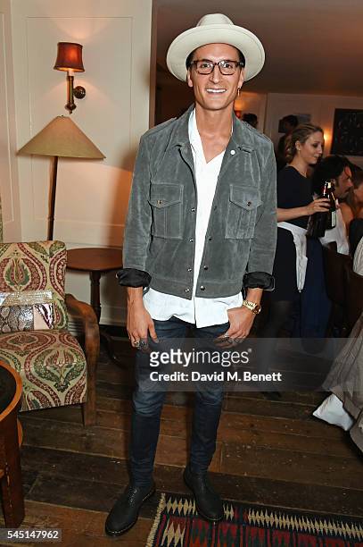Oliver Proudlock attends a private dinner hosted by Dylan Jones and Jean-David Malat to celebrate artist Mike Dargas at Soho House on July 5, 2016 in...