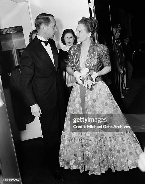 Actress Joan Crawford and husband Franchot Tone attend an event in Los Angeles, California.