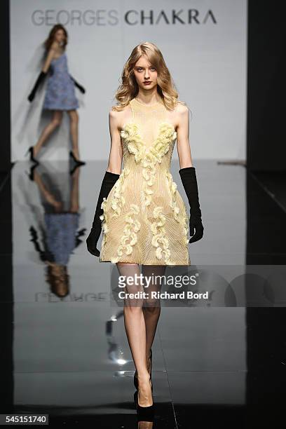 Model walks the runway during the Georges Chakra Haute Couture Fall/Winter 2016-2017 show as part of Paris Fashion Week on July 5, 2016 in Paris,...