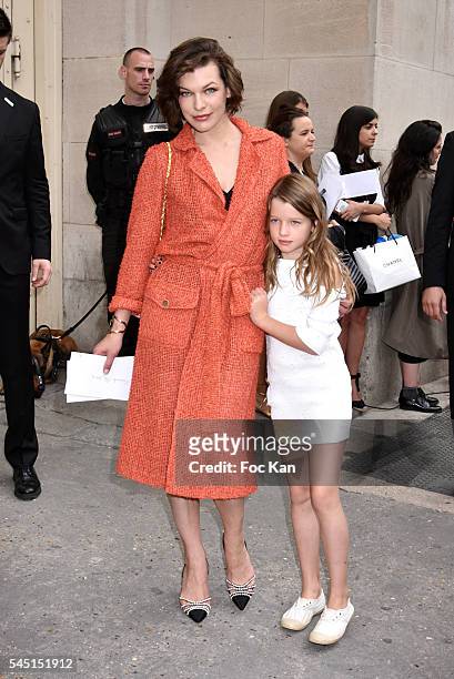 Milla Jovovich and her daughter Ever Gabo Anderson attend the Chanel show during Paris Fashion Week Haute Couture Fall/Winter 2016-2017 on July 5,...