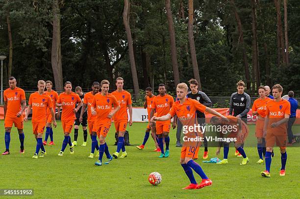 The players of The Netherlands U19 after the teamphoto during a training session of Netherlands U19 at July 5, 2016 in Heelsum, The Netherlands.