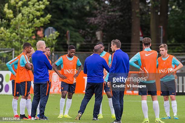 Coach Aron Winter of The Netherlands U19 give his players instructions during a training session of Netherlands U19 at July 5, 2016 in Heelsum, The...