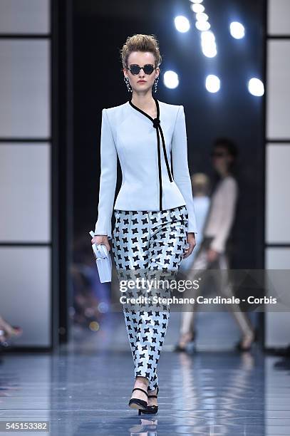Model walks the runway during the Giorgio Armani Prive Haute Couture Fall/Winter 2016-2017 show as part of Paris Fashion Week on July 5, 2016 in...