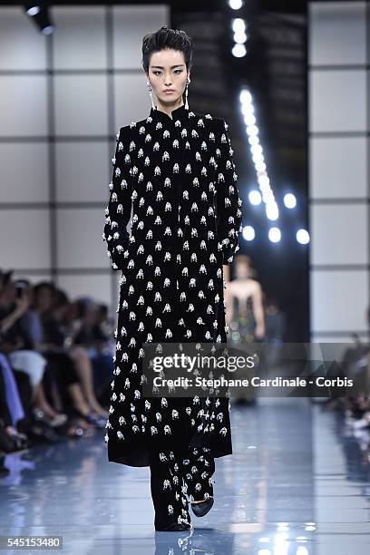 Model walks the runway during the Giorgio Armani Prive Haute Couture Fall/Winter 2016-2017 show as part of Paris Fashion Week on July 5, 2016 in...