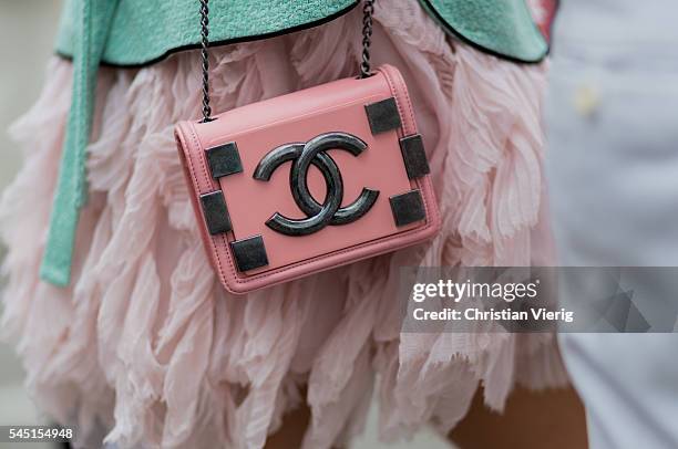 Pink Chanel bag outside Chanel during Paris Fashion Week Haute Couture F/W 2016/2017 on July 5, 2016 in Paris, France.