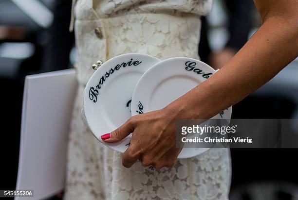 Brasserie Gabrielle Plate Minaudie Chanel bag outside Chanel during Paris Fashion Week Haute Couture F/W 2016/2017 on July 5, 2016 in Paris, France.