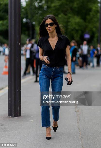 Barbara Martelo wearing a black blouse and navy denim jeans outside Chanel during Paris Fashion Week Haute Couture F/W 2016/2017 on July 5, 2016 in...