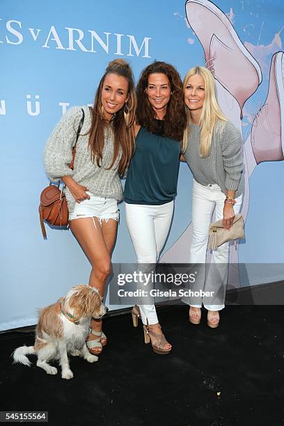 Annemarie Carpendale and her dog Seppi, Silvia Incardona and Tina Kaiser during the Iris von Arnim by Unuetzer launch party of the cashmere sneaker...