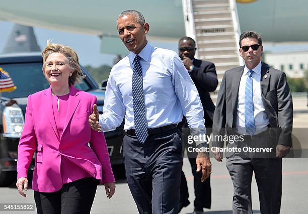 Hillary Clinton and President Obama arrive at Charlotte Douglas International Airport on Tuesday, July 5 in Charlotte, N.C. It was Obama's first...