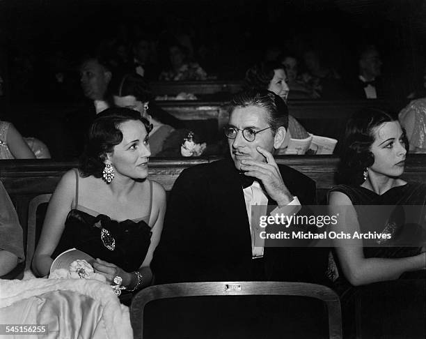 Actor Ronald Colman his wife Benita Hume and actress Hedy Lamarr attend the opera in Los Angeles, California.