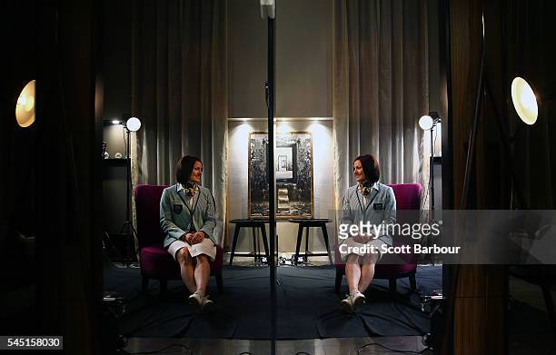 Australian athlete Anna Meares is reflected in a mirror as she poses for Getty Images photographer Michael Dodge at the Stamford Plaza during a...