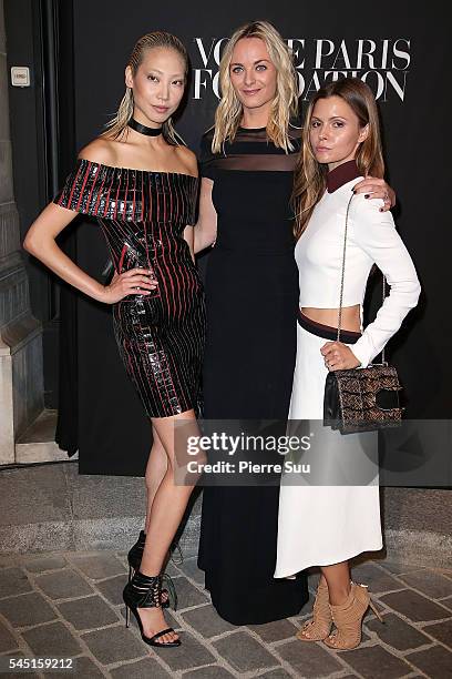 Soo Joo Park, Virginie Courtin Cesari and Elizabeth Sulcer attend the Vogue Foundation Gala 2016 at Palais Galliera on July 5, 2016 in Paris, France.