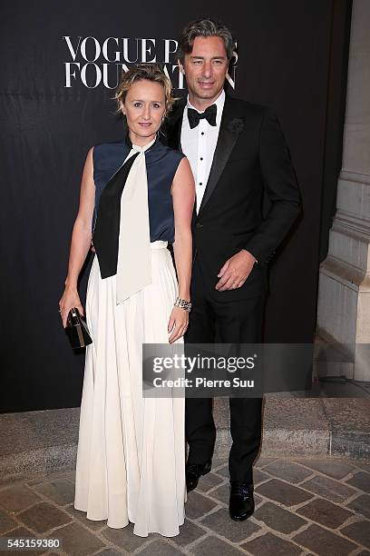 Caroline Roux and Laurent Solly attend the Vogue Foundation Gala 2016 at Palais Galliera on July 5, 2016 in Paris, France.