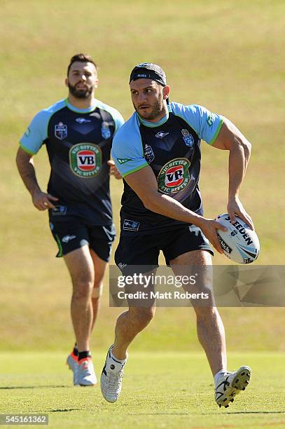 Robbie Farah of the Blues passes the ball during the New South Wales Blues State of Origin training session on July 6, 2016 in Coffs Harbour,...