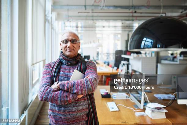 honest portrait of a small business owner - 65 69 years stock pictures, royalty-free photos & images