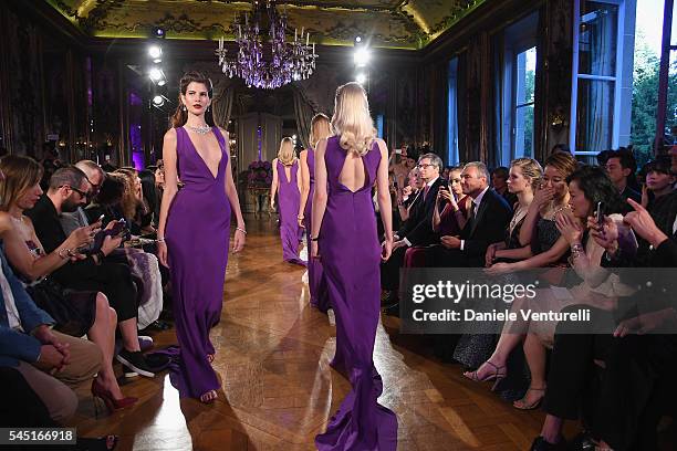 Models walk the runway during the Bulgari Celebration of Magnificent Inspirations, The New High Jewellery Collection during Paris Haute Couture at...