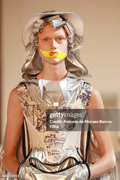 Model walks the runway during the Maison Margiela Haute Couture Fall/Winter 2016-2017 show as part of Paris Fashion Week on July 6, 2016 in Paris,...