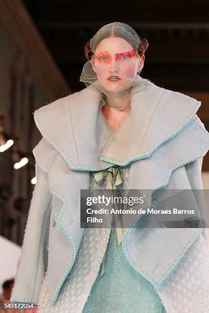 Model walks the runway during the Maison Margiela Haute Couture Fall/Winter 2016-2017 show as part of Paris Fashion Week on July 6, 2016 in Paris,...