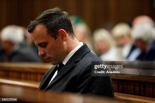 South African Paralympic athlete Oscar Pistorius sit on the chair at the North Gauteng High Court to attend summary judgement on his trial on July 6,...