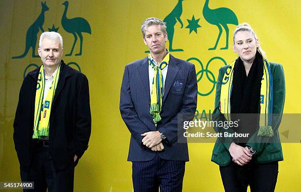 Anna Meares speaks as former Australian Olympic flag bearers Andrew Gaze, James Tomkins and Lauren Jackson look on during the Australian Olympic...