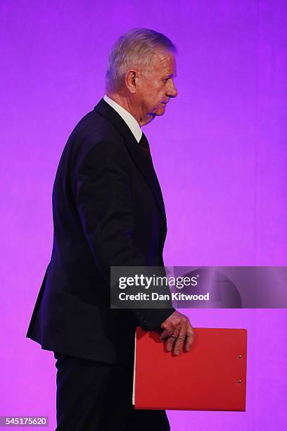 Sir John Chilcot leaves the stage after presenting The Iraq Inquiry Report at the Queen Elizabeth II Centre in Westminster on July 6, 2016 in London,...