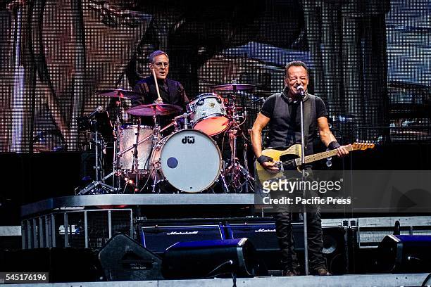 The american rock singer and song-writer Bruce Springsteen and the E Street Band pictured on stage as they perform live at San Siro Stadium in Milan,...