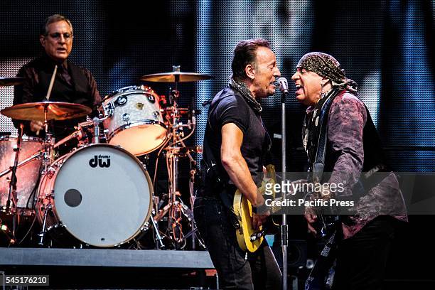 The american rock singer and song-writer Bruce Springsteen and the E Street Band pictured on stage as they perform live at San Siro Stadium in Milan,...