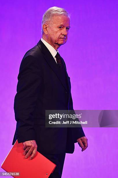 Sir John Chilcot leaves the stage after presenting The Iraq Inquiry Report at the Queen Elizabeth II Centre in Westminster on July 6, 2016 in London,...