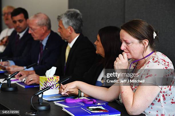 Rose Gentle and Sarah O'Connor, Relatives of military personnel killed during the Iraq War talk at a news conference after listening to Sir John...