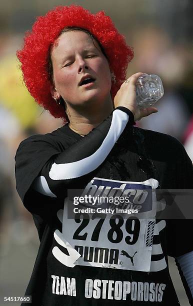 An athelete cools off during 'The Hydro Active Challenge For Women' which is the largest womens only 5km run in the UK at Milllenium Point on...
