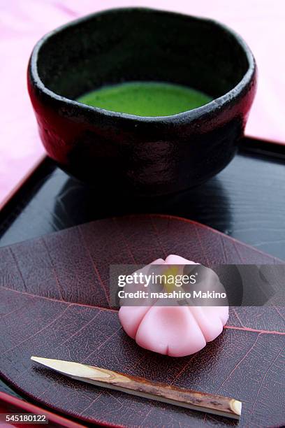 wagashi and matcha green tea - japanese sweet stock-fotos und bilder