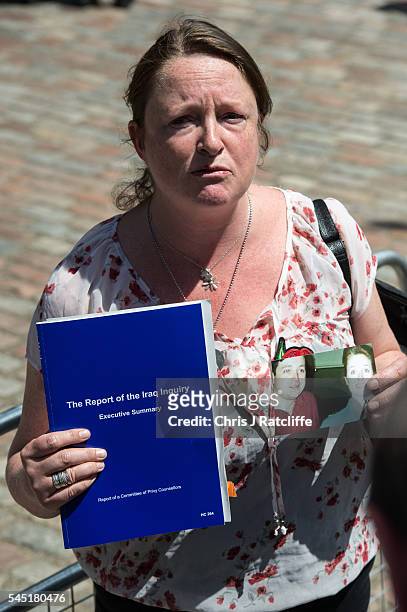 Sarah O'Connor, holds a picture of her brother Sergeant Bob O'Connor who was killed in Iraq in 2005, whilst speaking to the press outside the Queen...