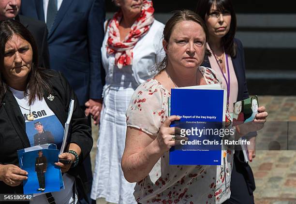 Sarah O'Connor, holds a picture of her brother Sergeant Bob O'Connor who was killed in Iraq in 2005, outside the Queen Elizabeth II conference centre...
