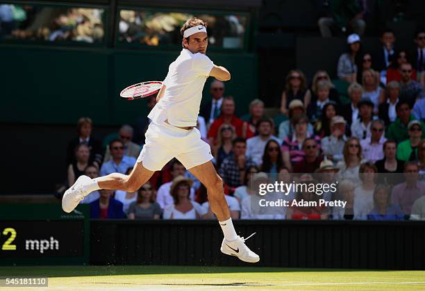 Roger Federer of Switzerland plays a forehand during the Men's Singles Quarter Finals match against Marin Cilic of Croatia on day nine of the...