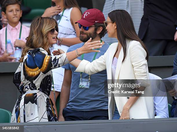 Mirka Federer, Bradley Cooper and Irina Shayk attend day nine of the Wimbledon Tennis Championships at Wimbledon on July 06, 2016 in London, England.