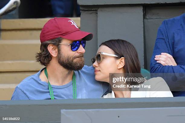 Bradley Cooper and Irina Shayk attend day nine of the Wimbledon Tennis Championships at Wimbledon on July 06, 2016 in London, England.